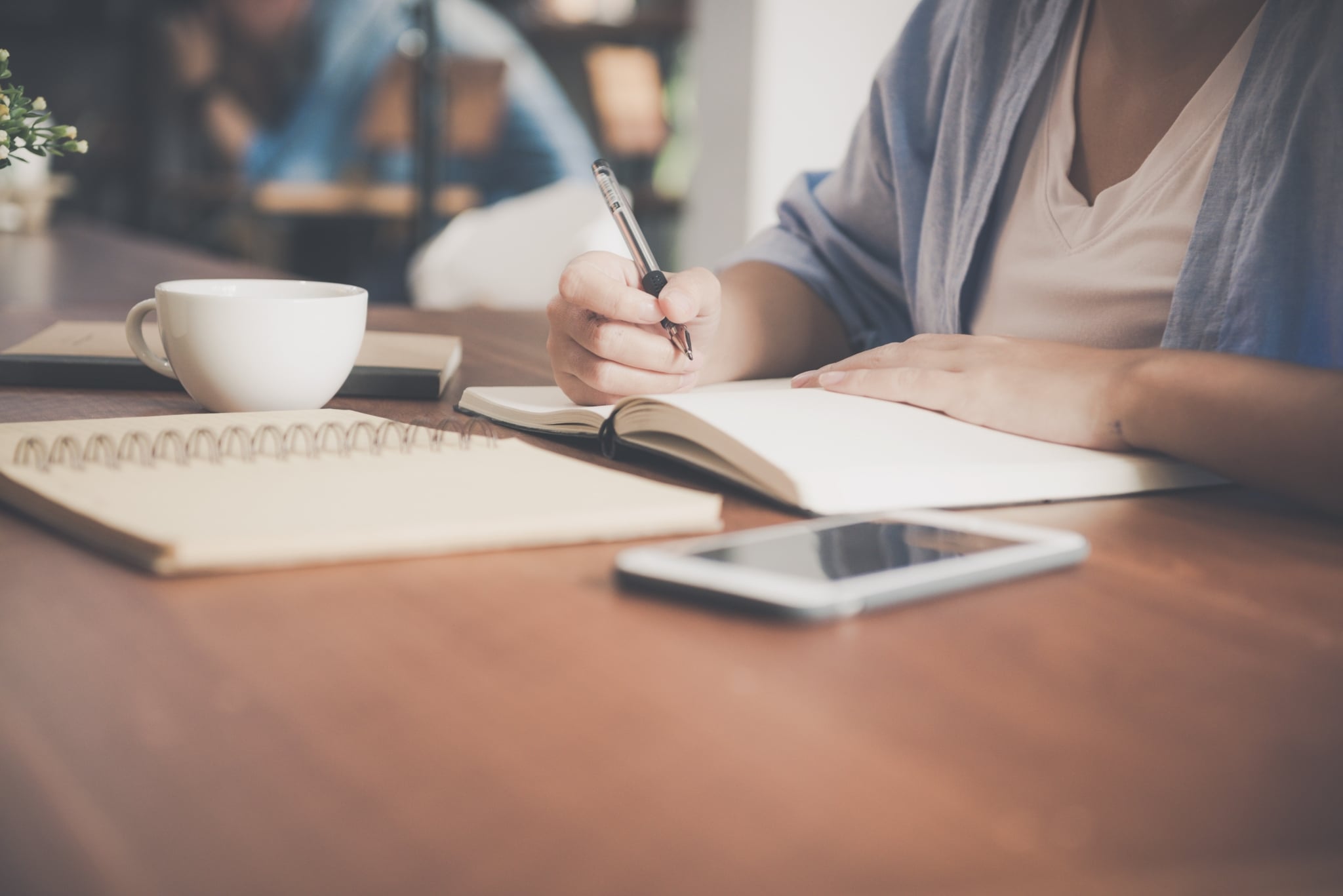 Woman taking notes