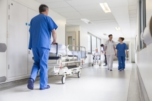 Healthcare professionals in a hospital hallway