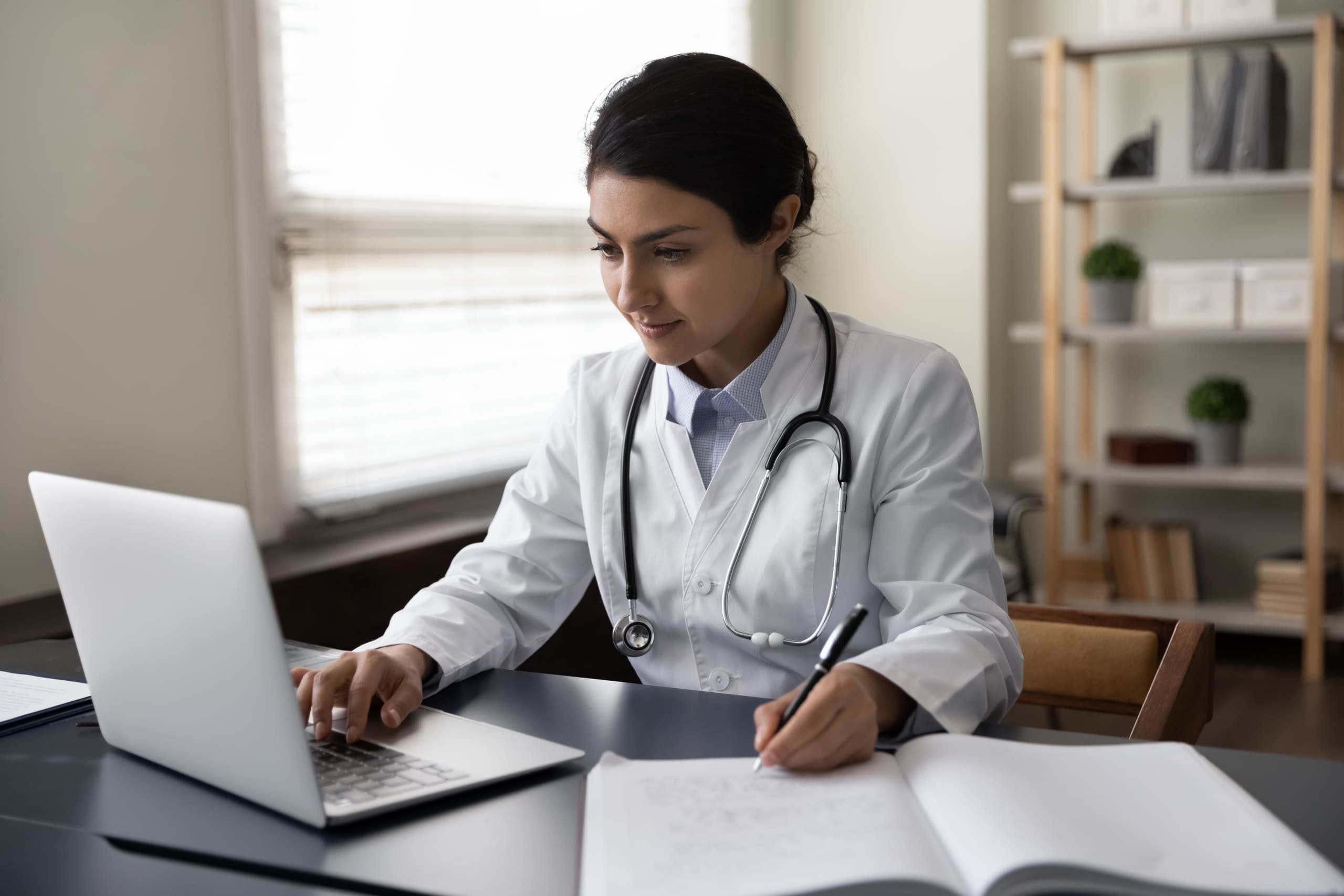 Young medical professional on a laptop