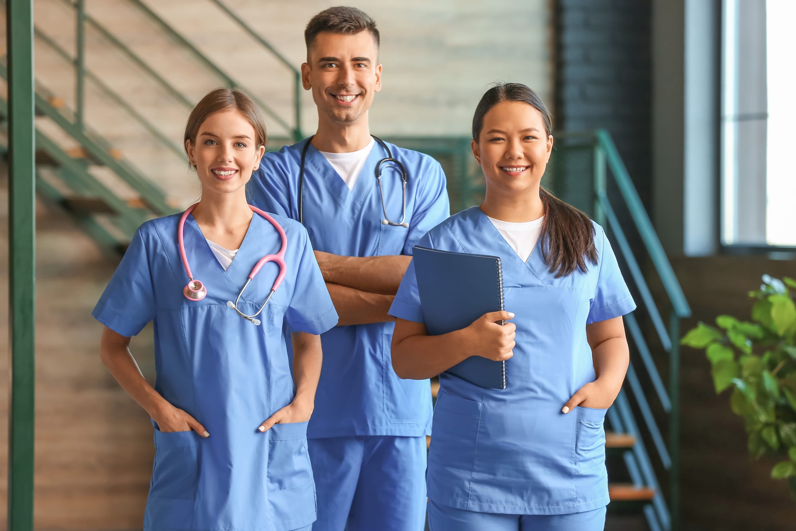 Group of medical professionals in scrubs