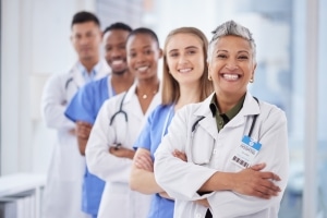 Group of diverse medical professionals standing in a line